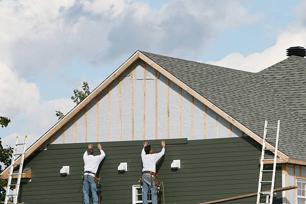 Professional Siding Replacement technician working in Chester, MD